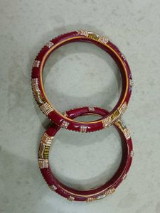 2  Maroon Bangles with Golden Embellishment