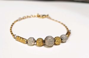 Elegant Gold and Silver Beaded Bracelet