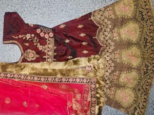 Embroidered Maroon Lehenga Choli with Pink Dupatta