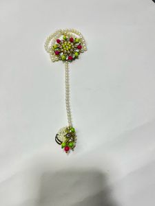 Pearl bracelet with attached ring