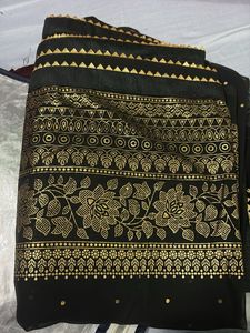 Elegant Black Saree with Gold Dots