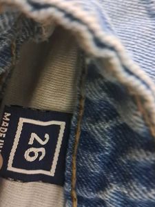 ripped denim mom jeans