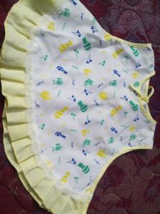 Cute Baby Girl's White Bib with Yellow Trim
