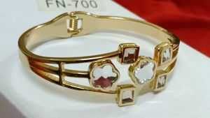 Elegant Gold Tone Bracelet with Crystals