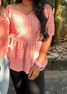 Gingham print pink peplum top