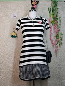Women's black and white striped polo tee