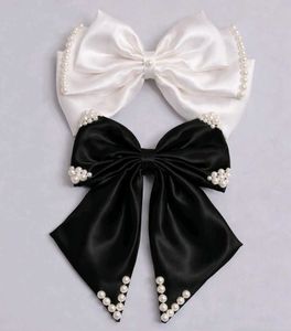 Pearl Embellished Bow Hair Clips (pack of 1)