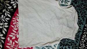 Sleeveless White Polo Top