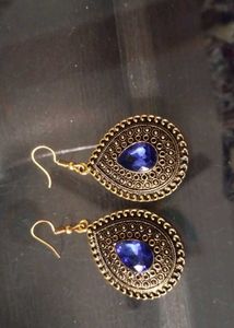 Golden Earing With Blue Gem