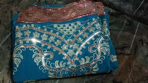 Elegant Teal Embellished Saree