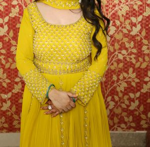 Yellow gown with heavy work