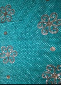Beautiful Teal Saree with Silver Embellishments