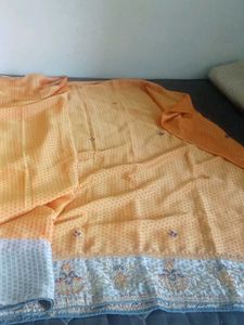 Beautiful Orange Saree with Embellished Border