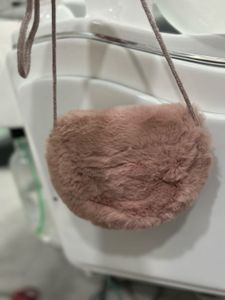dusty pink furry sling bag