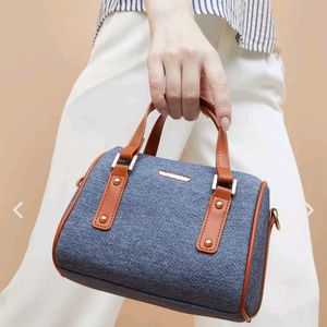 Ginger Stylish Denim Barrel Bag with Brown Accents