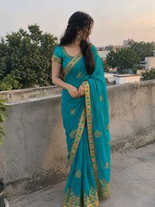 Stunning Teal Saree with Gold Embroidery