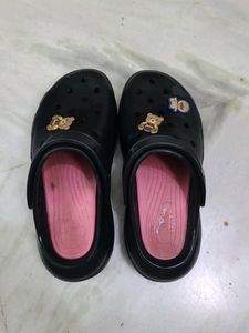 black pink crocs