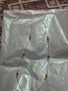 Elegant Gold Necklace with Emerald Pendant