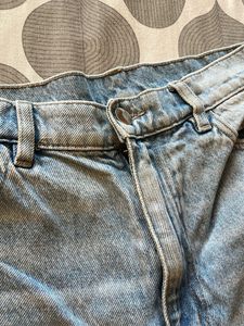 Distressed Light Wash Denim Jeans