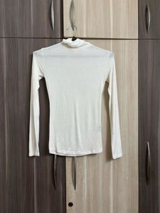 OZBRIDGE SHEER TURTLE NECK TOP