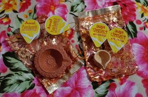 2 Pieces Diya + 4 Packs Amul Panchamrit