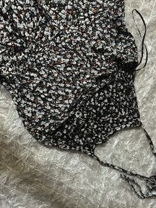 A Black Floral Jumpsuit
