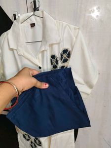 Elegant White Kurta with Blue Embellishments