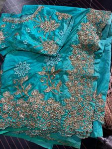 Beautiful Teal Embroidered saree with 34inch blous