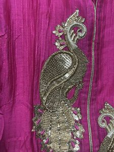 Beautiful Pink Kurta with Peacock Embellishment