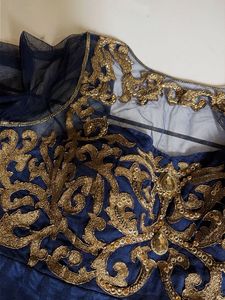 Elegant Navy Blue Gown with Gold Embellishments