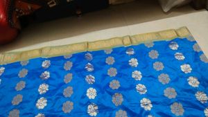 Vibrant Blue Saree with Floral Motif
