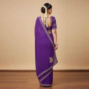 Vibrant Purple Saree with Embellished Blouse