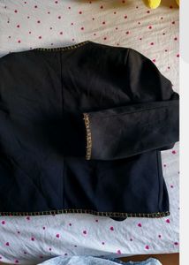 Chic Black Cropped Jacket with Gold Chain Trim
