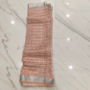 peach colour organza saree with designer blouse