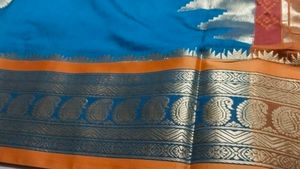 Elegant Teal and Gold Saree