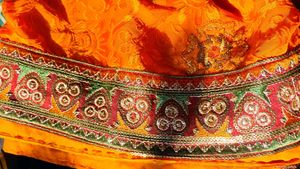 Exquisite Orange Saree Intricate Embellishmen
