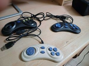 3 video game remote and 8 in 1 Cassettes