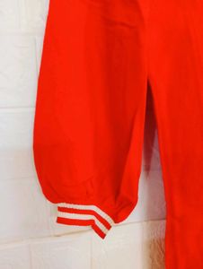 Chic Red Knit Top with Bow Details