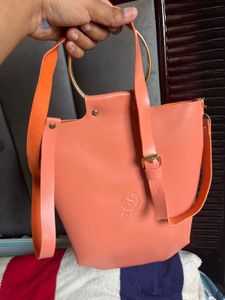 Chic Coral Hobo Bag with Gold Ring Handle