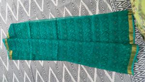 Elegant Teal  kota doria Saree with Gold Border