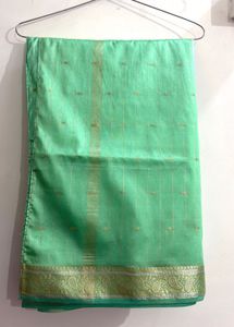 Elegant Mint Green Saree with Gold Border