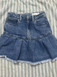 Denim Skirt with Pleats and Frayed Hem
