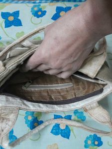 Brown cloth handbag