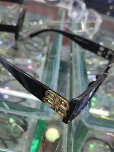 Chic Black Frames with Gold Accents