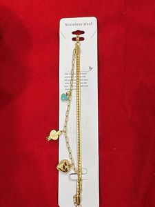 Gold Tone Charm Bracelet