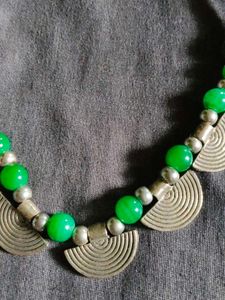 Green Beaded Necklace with Silver Charms