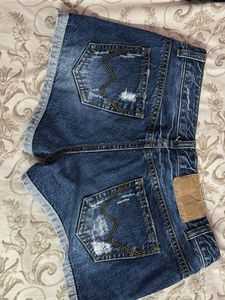 Ripped Denim Shorts