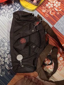 2 Clutches And 1 Handbag
