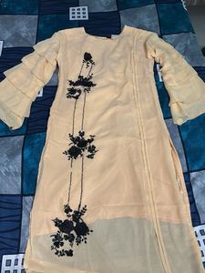 Elegant Peach Kurta with Floral Embroidery