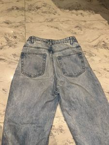 Light Wash Distressed Denim Jeans